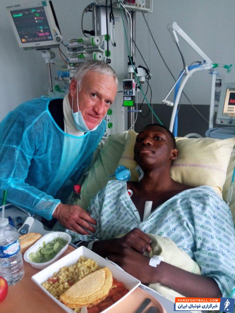 عیادت دیدیه دشان از ژان پیر ، بازیکن تیم برتینی پس از حمله قلبی وسط بازی