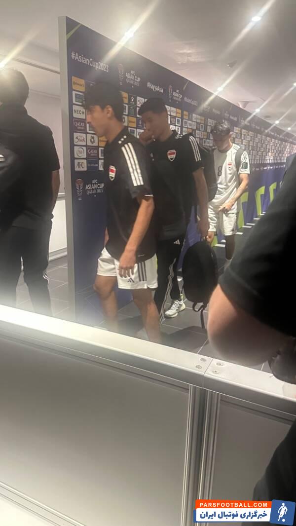 عراق ؛ چهره ناراحت بازیکنان عراق در حال عبور از میکسدزون ورزشگاه