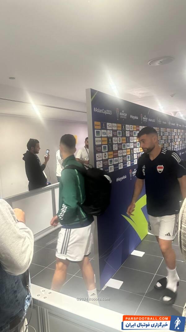 عراق ؛ چهره ناراحت بازیکنان عراق در حال عبور از میکسدزون ورزشگاه