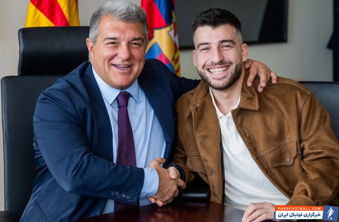 خوانیو کاتلا در کنار خوان لاپورتا، مدیر بارسلونا