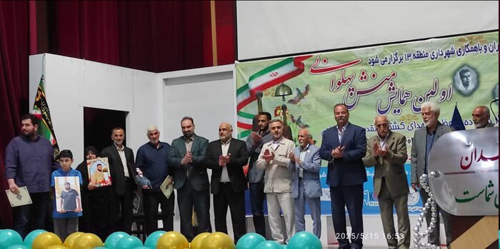 تجلیل از خانواده‌های شهدای کشتی‌گیر