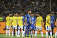 علیرضا کوشکی و مسعود جوما روی ساق بندهای خود عکس های جالبی حک کرده بودند