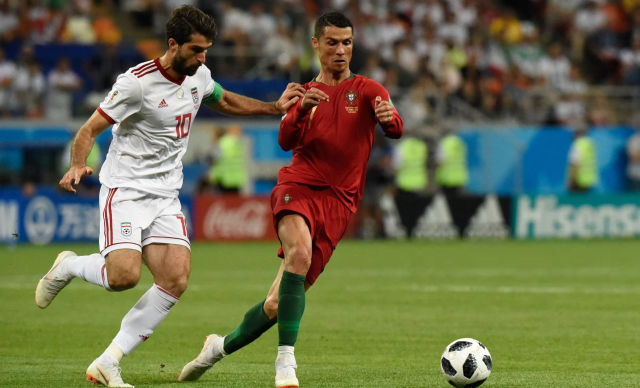 cristianoronaldo-karimanasarifard-iran-portugal-worldcup-2025 بازی تیم ملی ایران و پرتغال در جام جهانی 2018 - کریم انصاری فرد و کریستیانو رونالدو