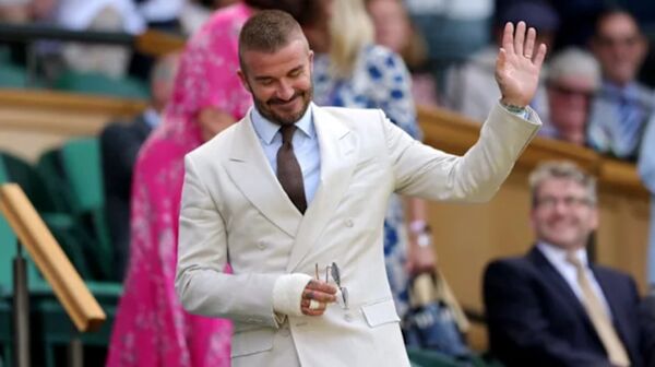 بکام با دست بسته، کنار ساوتگیت دیده شد!