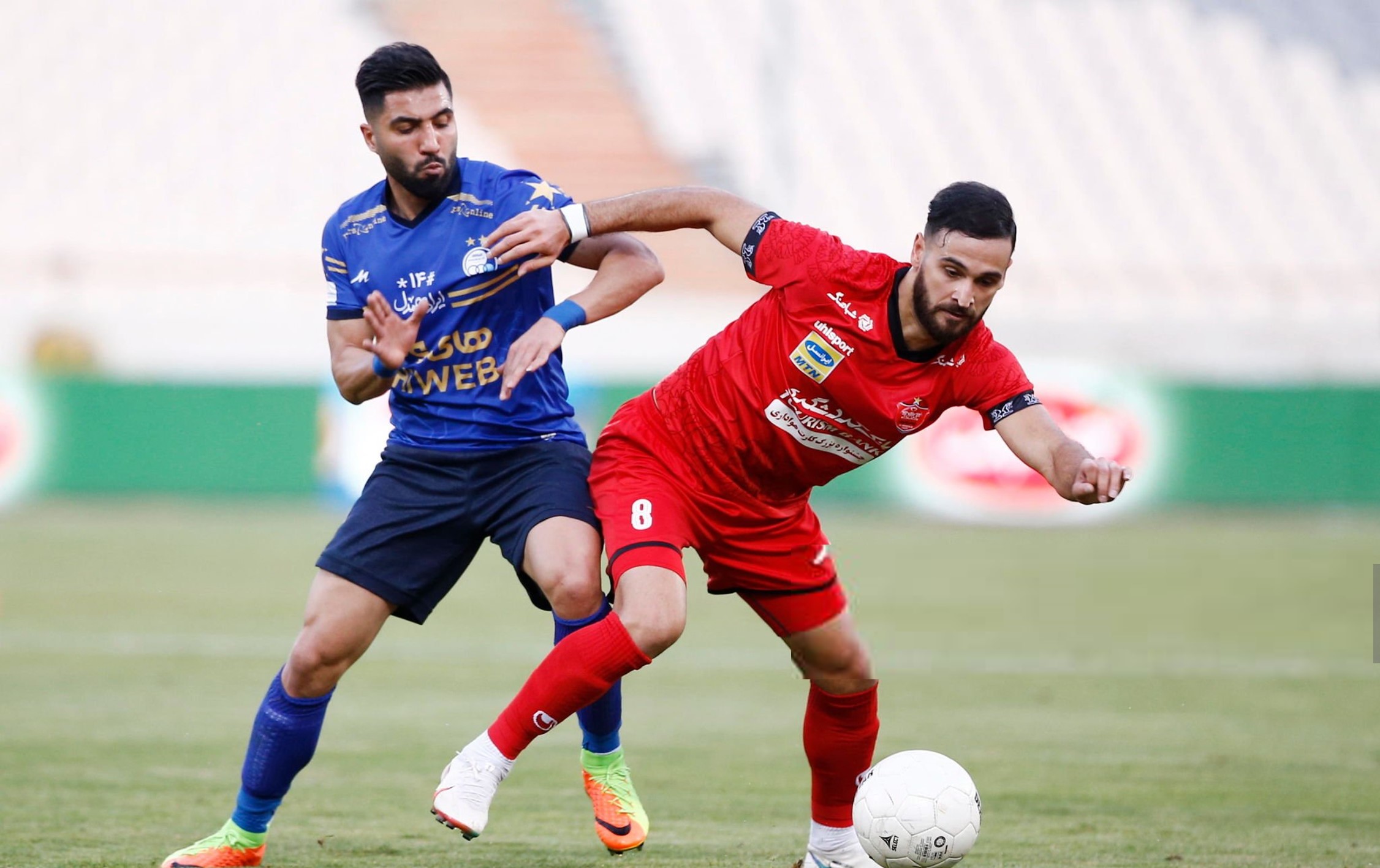 farshidesmaeili-esteghlal-ahmadnourolahi-perspolis-2025_0 فرشید اسماعیلی هافبک سابق استقلال تهران و احمد نوراللهی بازیکن سابق پرسپولیبس در قابی از دربی پایخت - لیگ برتر ایران