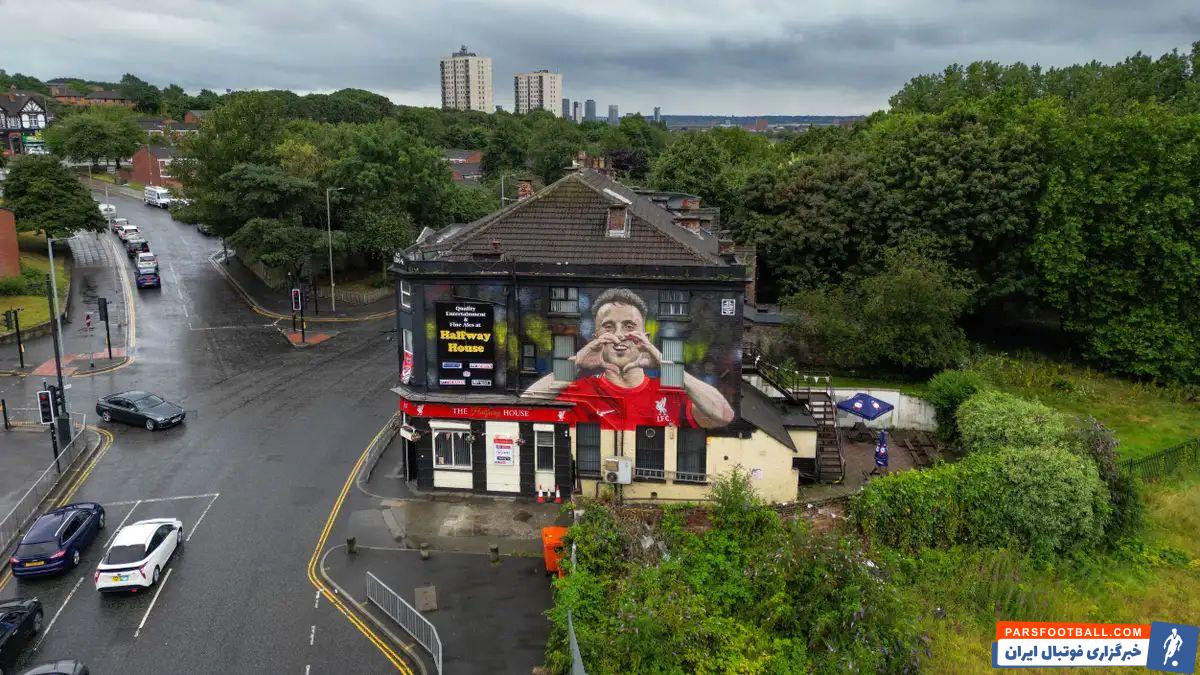 نقاشی دیواری ژوتا مرحوم بر دیوار بیرونی یکی از رستوران‌های معروف شهر لیورپول