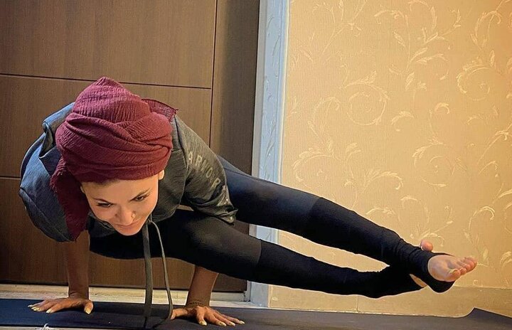 5649231 چرا یوگا را باید ورزشی همگانی دانست؟