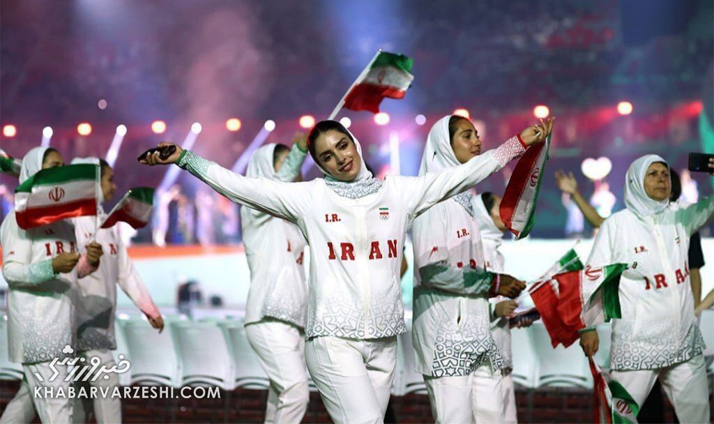 445728 دختر ایران با ژست خاص جهانی شد/ بانوی ورزشکار در پیست رژه کانون توجه عکاسان و رسانهها +عکس