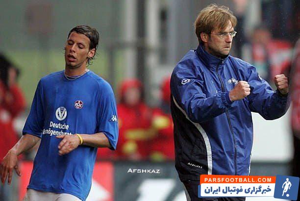 عکسی قدیمی از فریدون زندی در کنار یورگن کلوپ