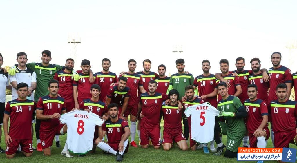 اعضای تیم ملی در آخرین تمرین پیش از بازی با سوریه، پیراهن مرتضی پورعلی گنجی و عارف غلامی را هم در عکس یادگاری خود جای دادند.